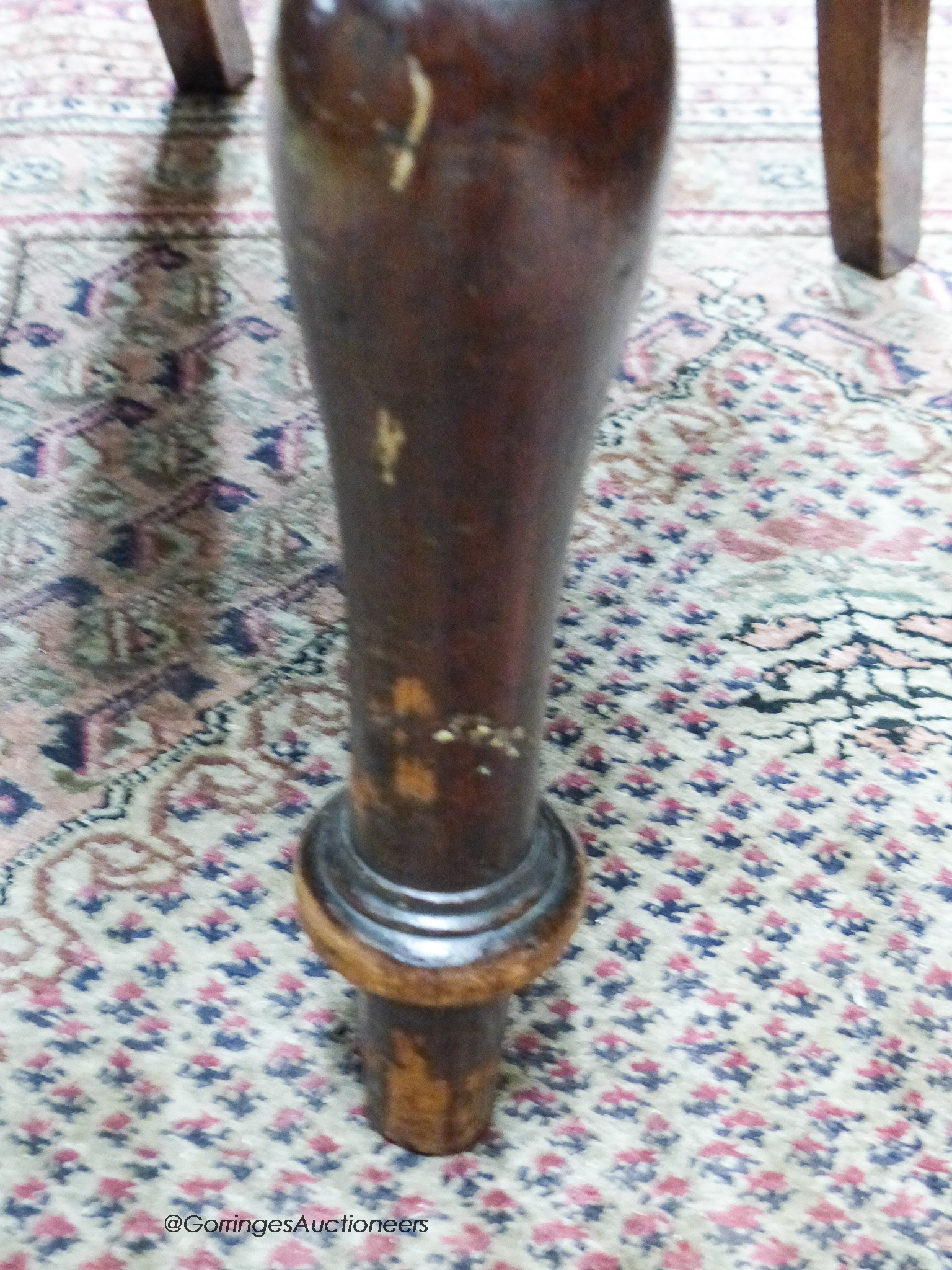 A set of six Victorian mahogany balloon-back dining chairs